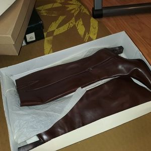 Brown knee high leather boots
